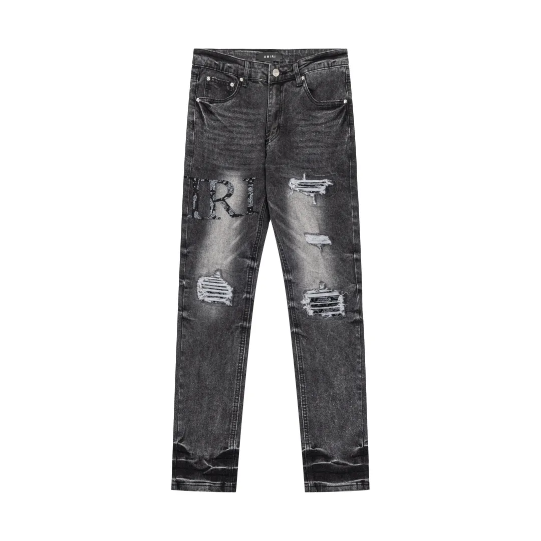 (Top version) AMIRI's new high-luxury heavy-duty stretch water patch embroidered high-street trendy men's and women's couple jeans AMIRI's family uses organic long-staple cotton denim fabrics originating in Los Angeles this year! After a pure natural alkaline phosphatase washing process, the special blue Gray tone is noble and high-end. It feels skin-friendly and delicate, and the inner layer is particularly comfortable when touching the skin! The elastic spandex component makes it particularly comfortable for daily activities. The original and rare Premium fabric is a rare find! Details after details! Amiri's New Arrival high street luxury jeans in Los Angeles mall! The front and back pieces have undergone a multi-layered three-dimensional polishing process, giving the upper body a stylish texture! The metal laser embossed MA metal Brown Nappa leather label on the waist is very exquisite! The pockets are also inlaid with tungsten steel metal logos, and the interior has exquisite ceiling-level workmanship! Hot sale jeans in Los Angeles counters! Enjoy the quality when you wear it yourself, and the value is high as a gift! Manage any large-scale business occasions and Premium private clubs without stress! Highly recommended to buy! Style number: 2058 Color: Black Size: 28 30 32 34