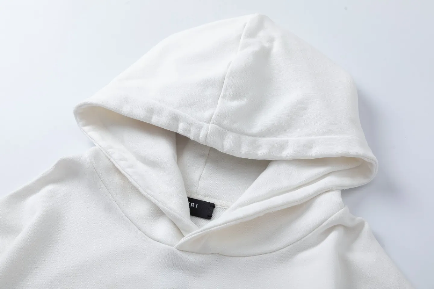 7119# ，AMIRI logo. ：White，Black。Size：S M L XL