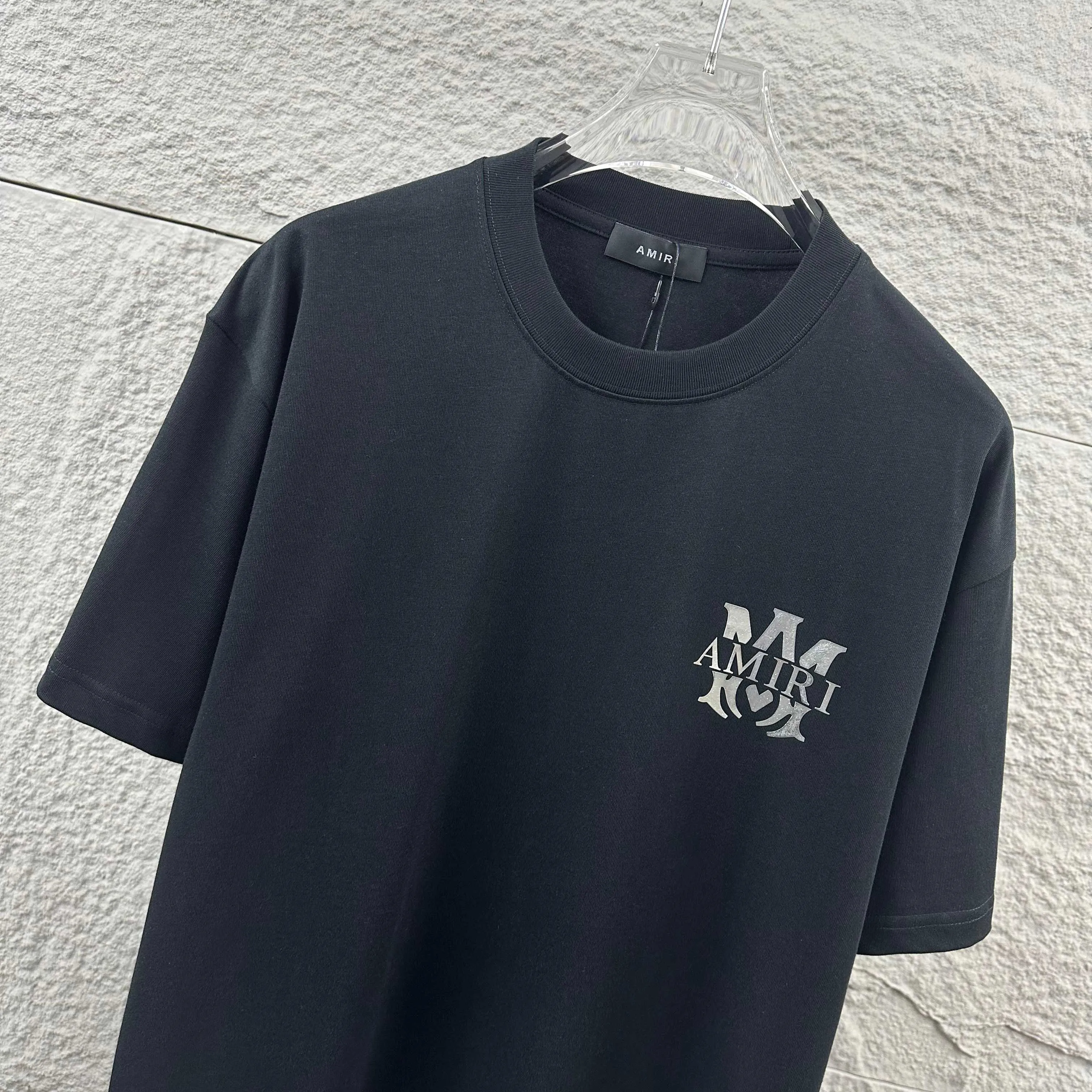 Amiri*Emile 2026 Early Spring and Summer New Arrival Customized plain cotton double yarn fabric Short-sleeved T-shirt Classic letter silvering process Men and women Same Style Color: Black White Size: S (90-130 pounds) M (120-150 pounds) L (140-165 pounds) XL (160-180 pounds) XXL (180 pounds)