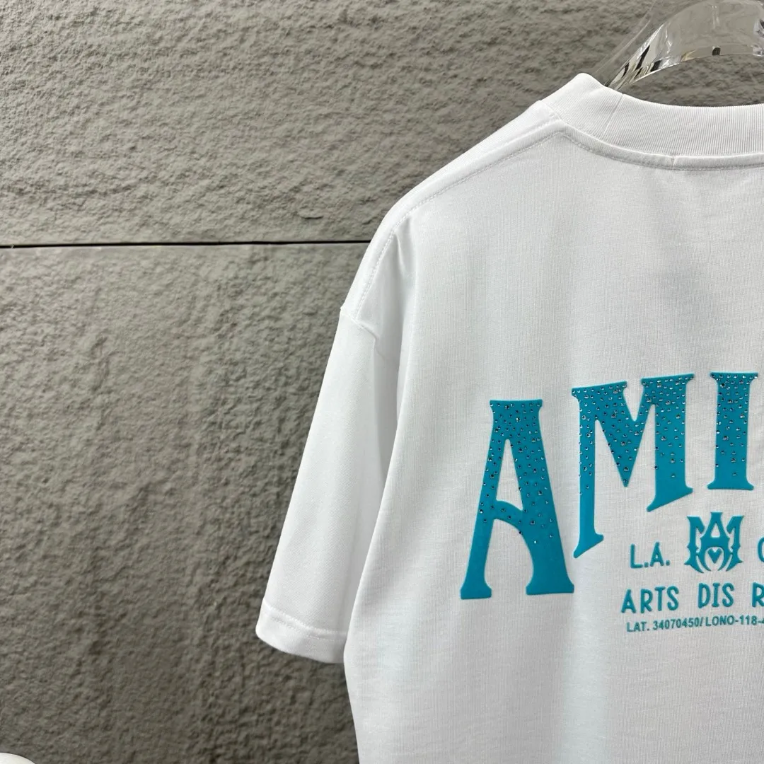 Amiri*Emile 2026 Early Spring and Summer New Arrival Customized plain cotton double yarn fabric Short-sleeved T-shirt Classic letter hot diamond + flocking technology Men and women Same Style Color: Black White Size: S (90-130 pounds) M (120-150 pounds) L (140-165 pounds) XL (160-180 pounds) XXL (180 pounds)