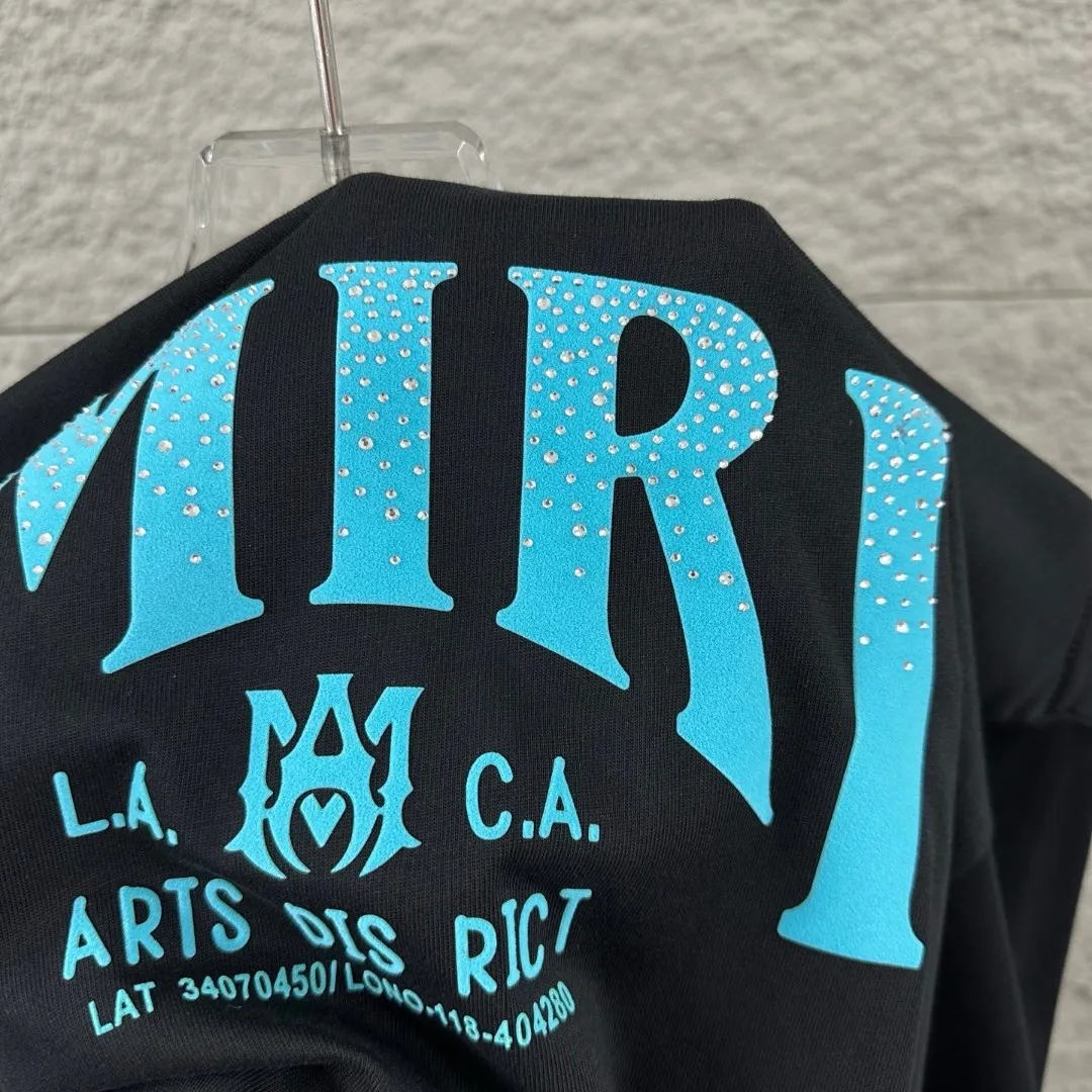 Amiri*Emile 2026 Early Spring and Summer New Arrival Customized plain cotton double yarn fabric Short-sleeved T-shirt Classic letter hot diamond + flocking technology Men and women Same Style Color: Black White Size: S (90-130 pounds) M (120-150 pounds) L (140-165 pounds) XL (160-180 pounds) XXL (180 pounds)