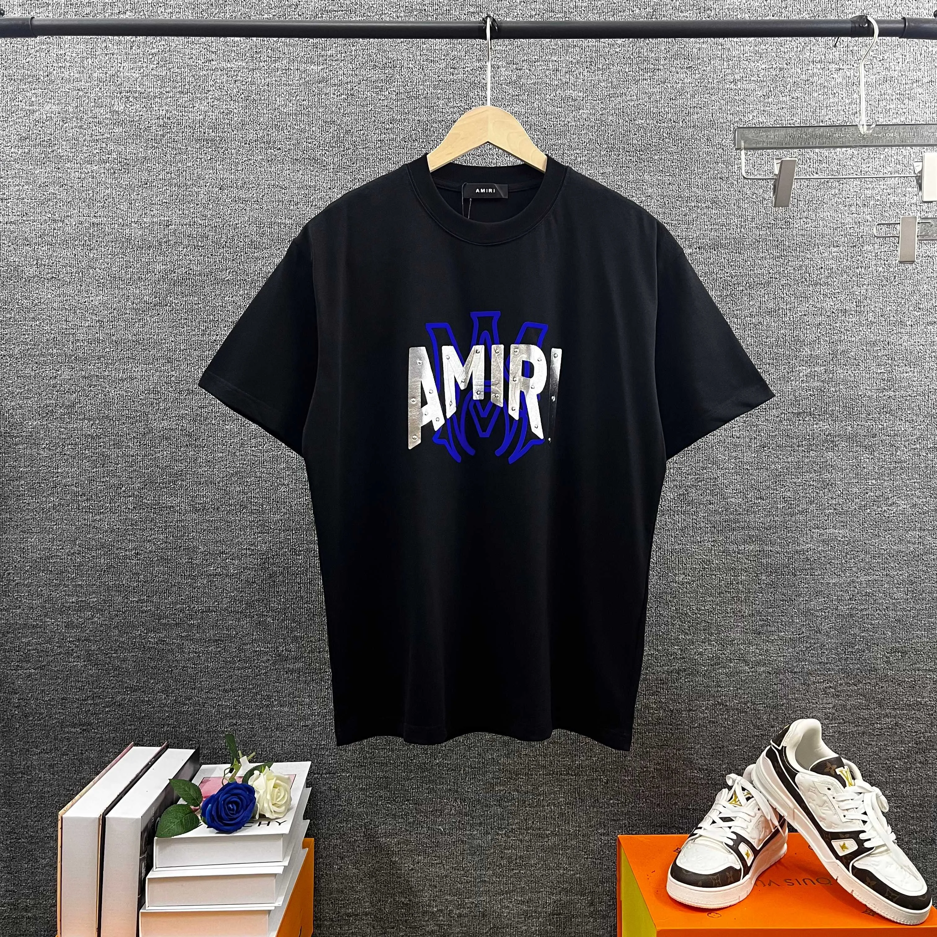 Amir*E*mir 2026 spring and summer New Arrival short-sleeved T-shirt Classic letters Silver silicone + flocking technology Customized plain cotton double yarn fabric Men and women Same Style Color: Black White Size: S (90-130 pounds) M (120-150 pounds) L (140-165 pounds) XL (160-180 pounds) XXL (180 pounds)