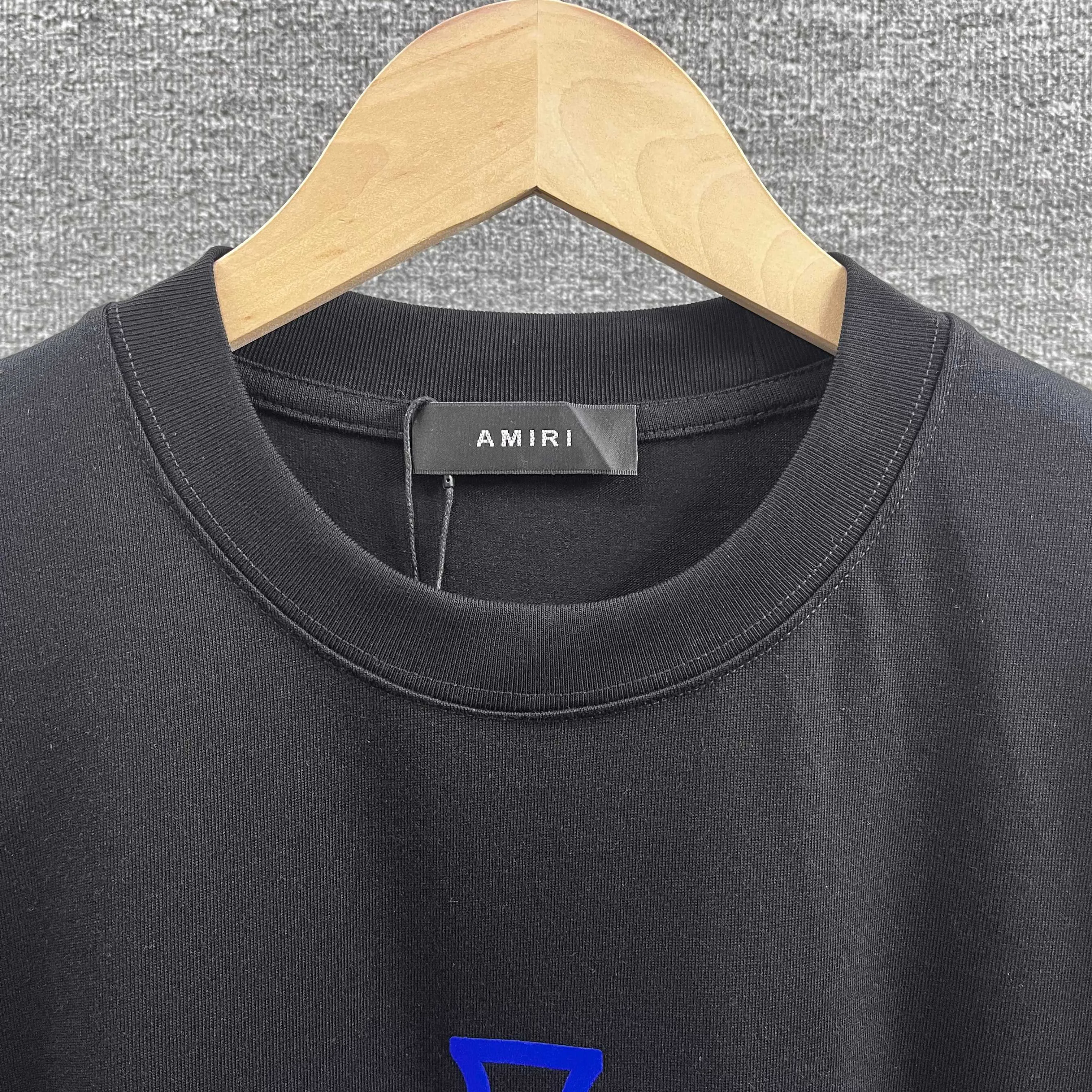 Amir*E*mir 2026 spring and summer New Arrival short-sleeved T-shirt Classic letters Silver silicone + flocking technology Customized plain cotton double yarn fabric Men and women Same Style Color: Black White Size: S (90-130 pounds) M (120-150 pounds) L (140-165 pounds) XL (160-180 pounds) XXL (180 pounds)