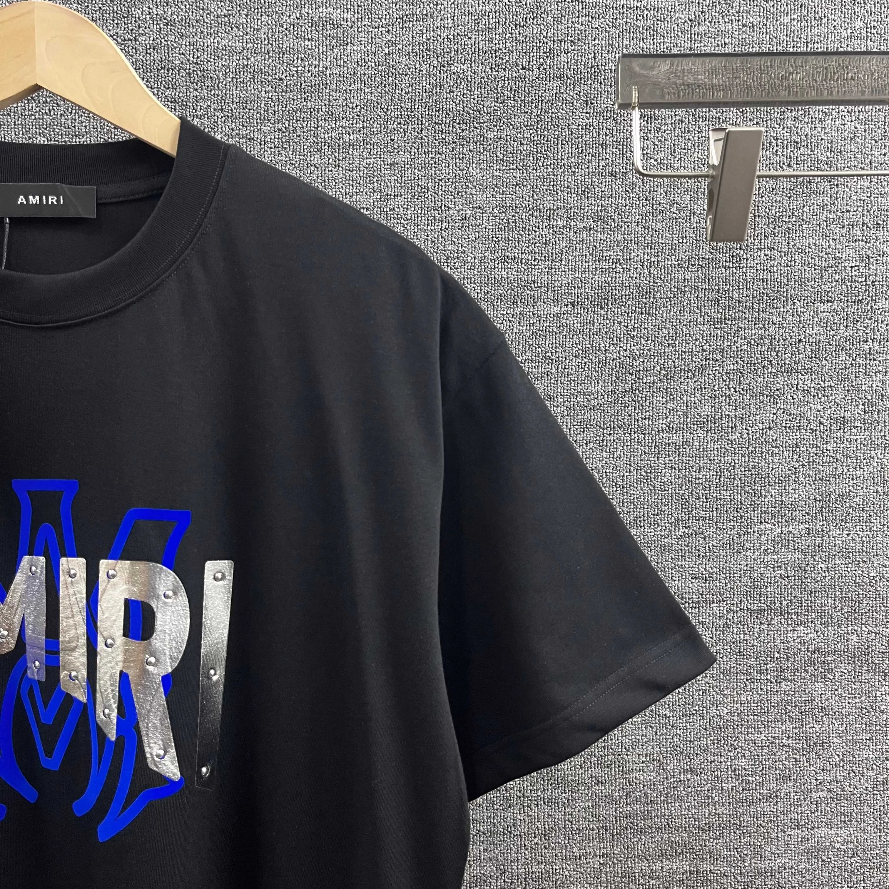 Amir*E*mir 2026 spring and summer New Arrival short-sleeved T-shirt Classic letters Silver silicone + flocking technology Customized plain cotton double yarn fabric Men and women Same Style Color: Black White Size: S (90-130 pounds) M (120-150 pounds) L (140-165 pounds) XL (160-180 pounds) XXL (180 pounds)