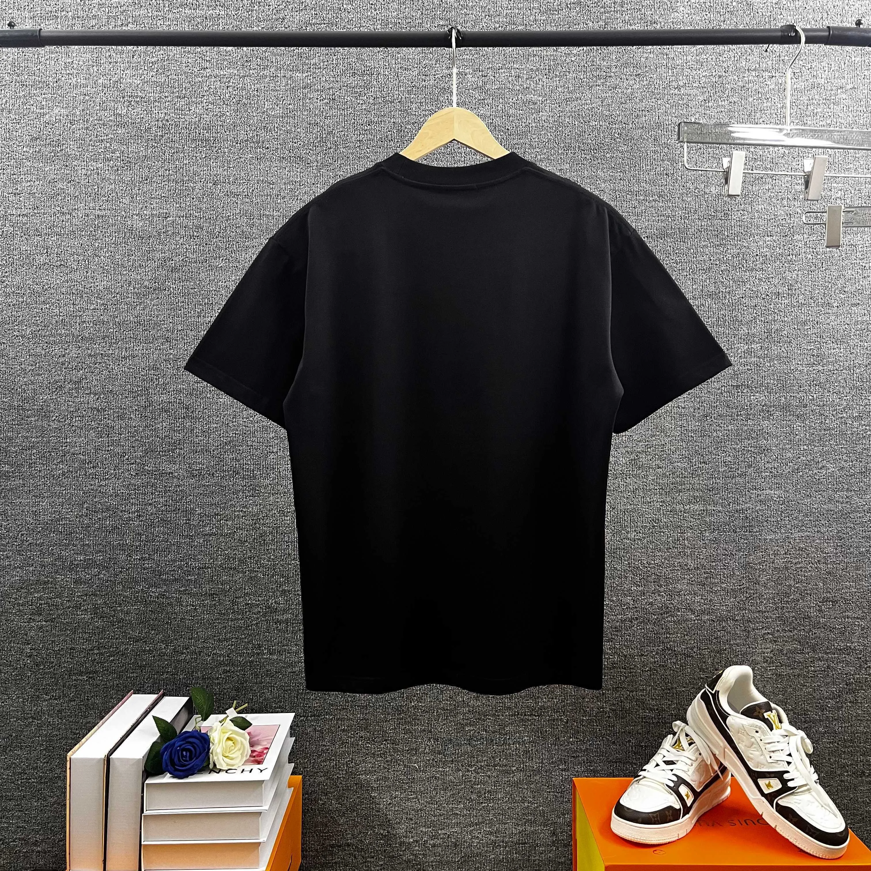 Amir*E*mir 2026 spring and summer New Arrival short-sleeved T-shirt Classic letters Silver silicone + flocking technology Customized plain cotton double yarn fabric Men and women Same Style Color: Black White Size: S (90-130 pounds) M (120-150 pounds) L (140-165 pounds) XL (160-180 pounds) XXL (180 pounds)