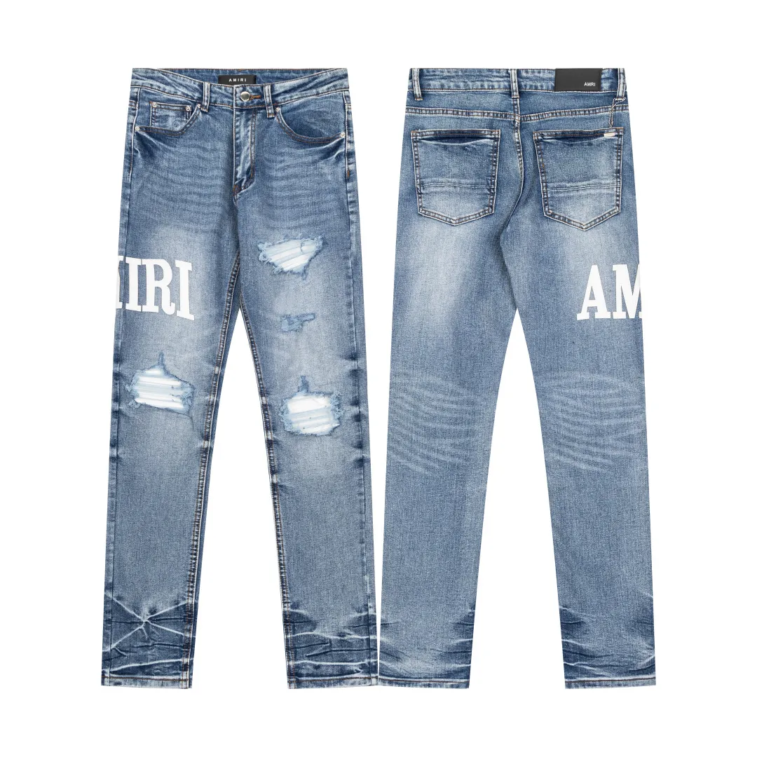(Top version) AMIRI's new high-luxury heavy-duty stretch water patch embroidered high-street trendy men's and women's couple jeans AMIRI's family uses organic long-staple cotton denim fabrics originating in Los Angeles this year! After a pure natural alkaline phosphatase washing process, the special blue Gray tone is noble and high-end. It feels skin-friendly and delicate, and the inner layer is particularly comfortable when touching the skin! The elastic spandex component makes it particularly comfortable for daily activities. The original and rare Premium fabric is a rare find! Details after details! Amiri's New Arrival high street luxury jeans in Los Angeles mall! The front and back pieces have undergone a multi-layered three-dimensional polishing process, giving the upper body a stylish texture! The metal laser embossed MA metal Brown Nappa leather label on the waist is very exquisite! The pockets are also inlaid with tungsten steel metal logos, and the interior has exquisite ceiling-level workmanship! Hot sale jeans in Los Angeles counters! Enjoy the quality when you wear it yourself, and the value is high as a gift! Manage any large-scale business occasions and Premium private clubs without stress! Highly recommended to buy! Style number: 2059 Color: Blue Size: 28 30 32 34