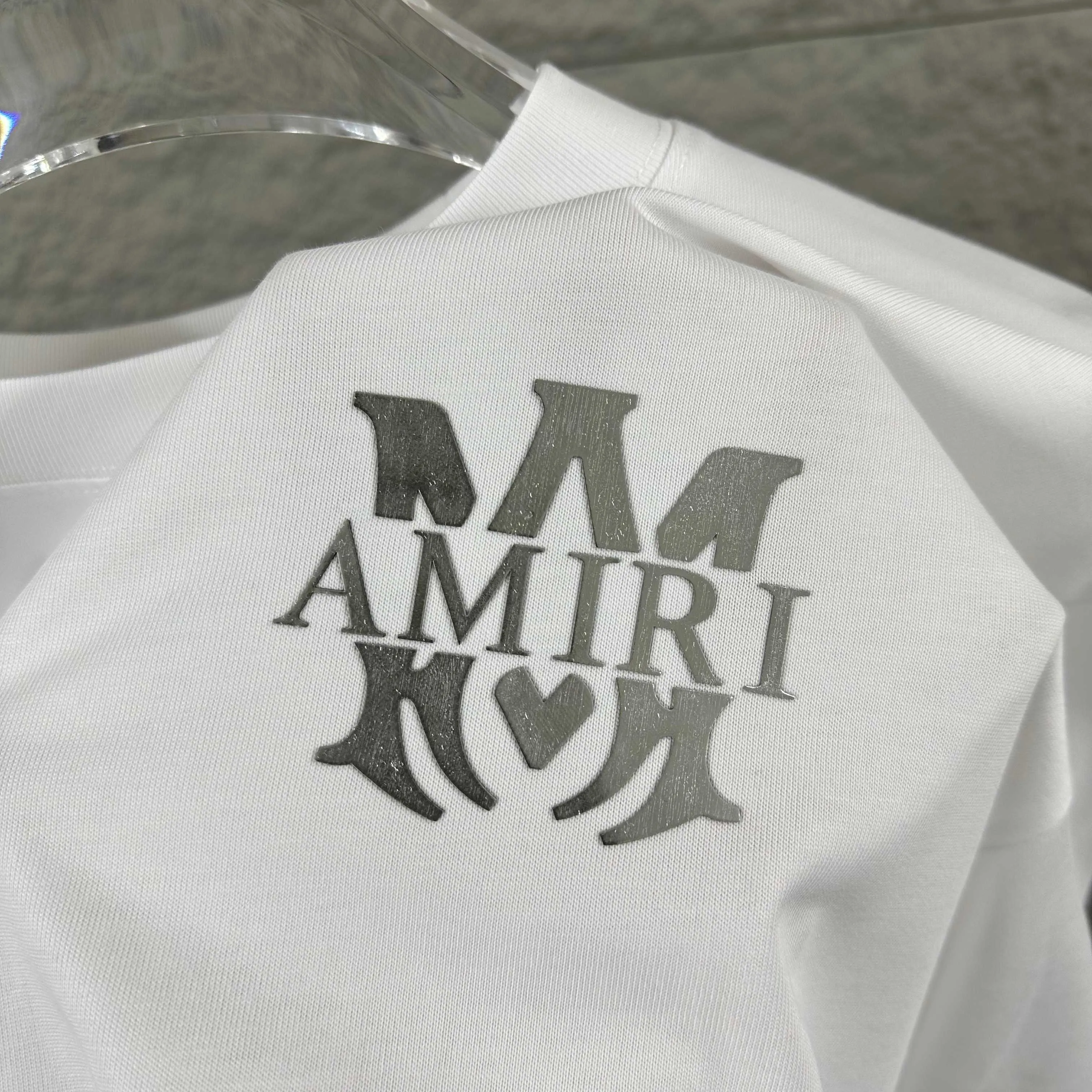 Amiri*Emile 2026 Early Spring and Summer New Arrival Customized plain cotton double yarn fabric Short-sleeved T-shirt Classic letter silvering process Men and women Same Style Color: Black White Size: S (90-130 pounds) M (120-150 pounds) L (140-165 pounds) XL (160-180 pounds) XXL (180 pounds)