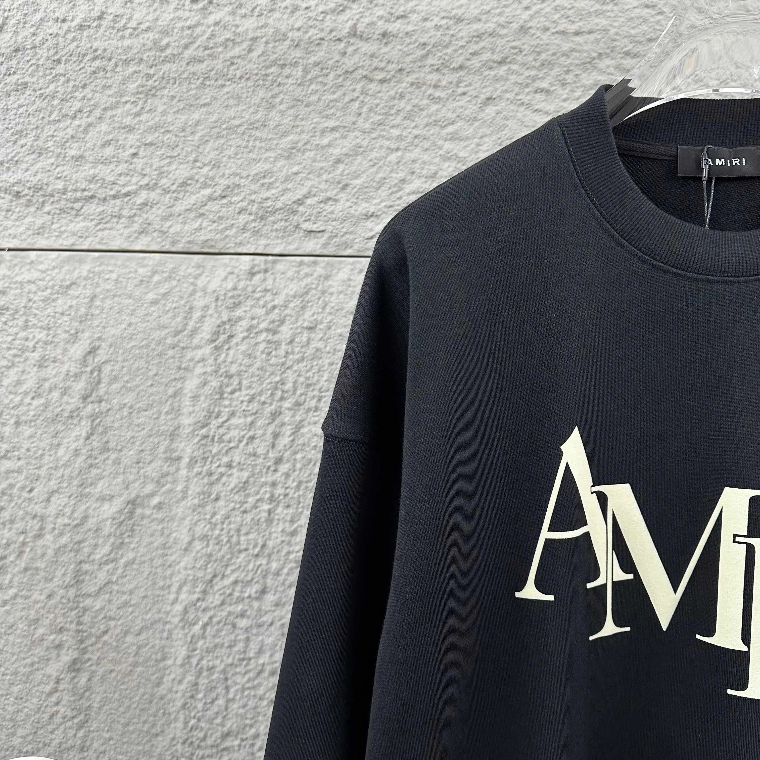 Amiri*Emile 2026 Early Autumn and Winter New Arrival Classic letter totem three-dimensional flocking technology Customized terry fabric Long-sleeved round neck sweatshirt Men and women Same Style Color: Black White Size: S (90-130 pounds) M (120-150 pounds) L (140-165 pounds) XL (160-180 pounds) XXL (180 pounds)
