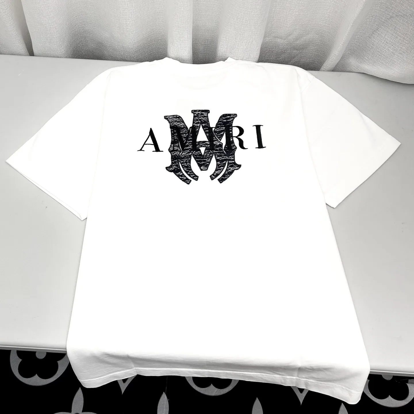 AMIRI logo m-xxl