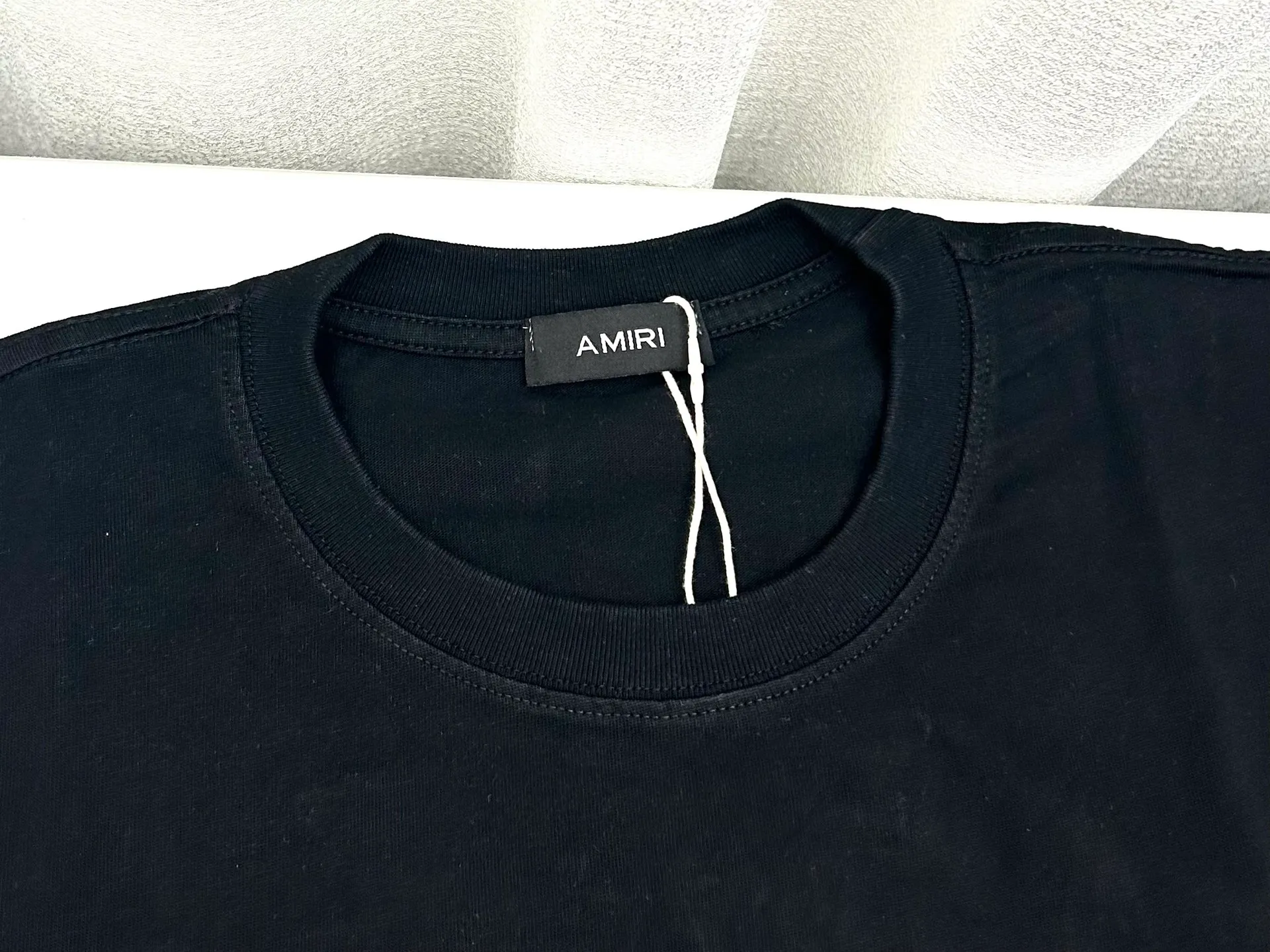 AMIRI logo m-xxl