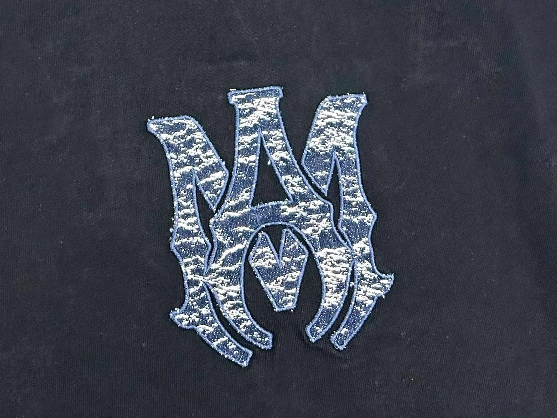 AMIRI logo m-xxl