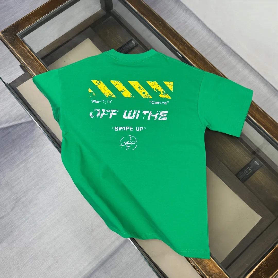 C🌟 OFF-WHITE 2026ss new spring and summer couple's round neck T-shirt🔥 Luxurious brand letter LOGO mark👍🏼 You can feel the youthfulness and fashion brought by this design on your upper body! The overall style is fashionable and trendy. The fabrics are made of top-quality fabrics supplied by customers. They are soft, skin-friendly, breathable, and have good stiffness and drape. The upper body is in fashionable and trendy colors. It is a must-have item for summer! Color: Black White Green Size: XS-S-M-L (loose fit, please state your height and weight when placing an order)