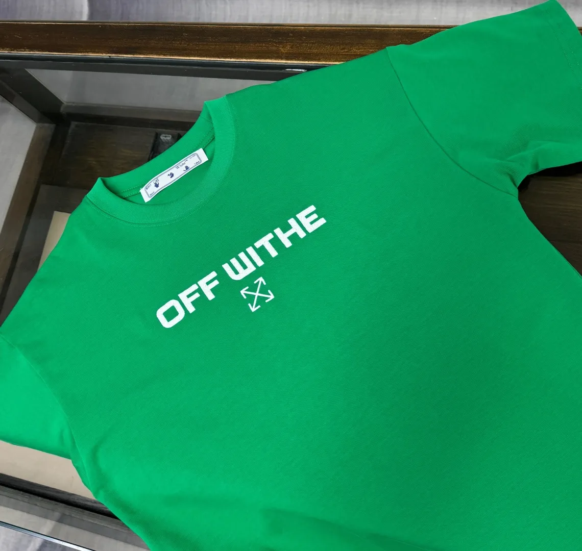 C🌟 OFF-WHITE 2026ss new spring and summer couple's round neck T-shirt🔥 Luxurious brand letter LOGO mark👍🏼 You can feel the youthfulness and fashion brought by this design on your upper body! The overall style is fashionable and trendy. The fabrics are made of top-quality fabrics supplied by customers. They are soft, skin-friendly, breathable, and have good stiffness and drape. The upper body is in fashionable and trendy colors. It is a must-have item for summer! Color: Black White Green Size: XS-S-M-L (loose fit, please state your height and weight when placing an order)