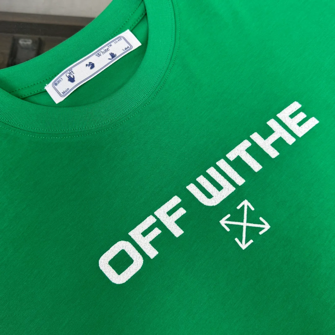 C🌟 OFF-WHITE 2026ss new spring and summer couple's round neck T-shirt🔥 Luxurious brand letter LOGO mark👍🏼 You can feel the youthfulness and fashion brought by this design on your upper body! The overall style is fashionable and trendy. The fabrics are made of top-quality fabrics supplied by customers. They are soft, skin-friendly, breathable, and have good stiffness and drape. The upper body is in fashionable and trendy colors. It is a must-have item for summer! Color: Black White Green Size: XS-S-M-L (loose fit, please state your height and weight when placing an order)