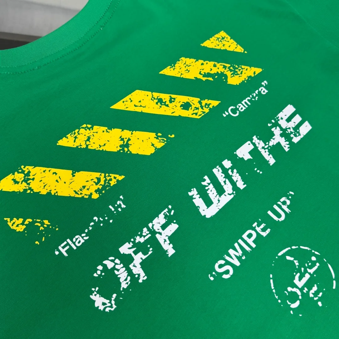 C🌟 OFF-WHITE 2026ss new spring and summer couple's round neck T-shirt🔥 Luxurious brand letter LOGO mark👍🏼 You can feel the youthfulness and fashion brought by this design on your upper body! The overall style is fashionable and trendy. The fabrics are made of top-quality fabrics supplied by customers. They are soft, skin-friendly, breathable, and have good stiffness and drape. The upper body is in fashionable and trendy colors. It is a must-have item for summer! Color: Black White Green Size: XS-S-M-L (loose fit, please state your height and weight when placing an order)