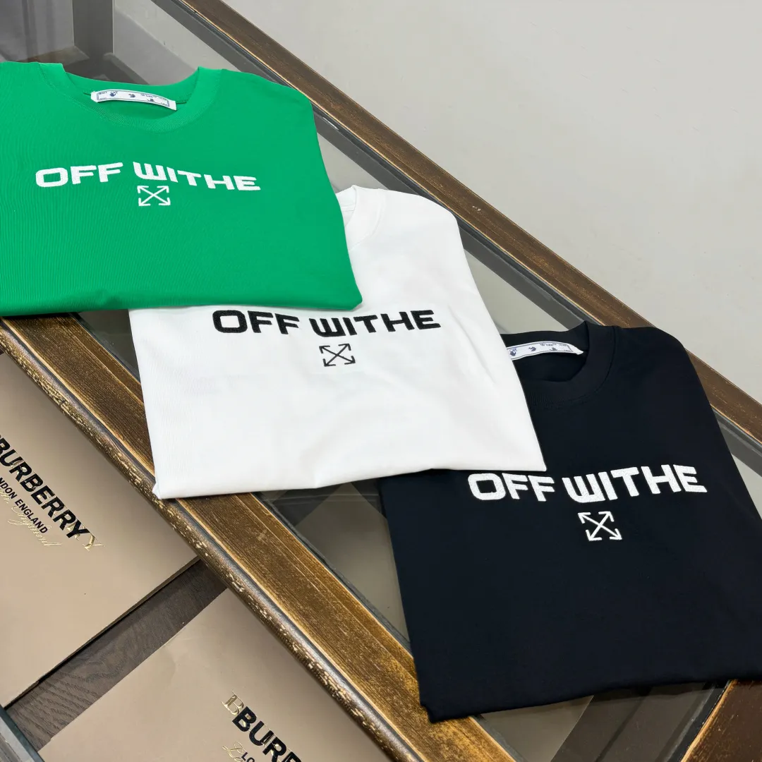 C🌟 OFF-WHITE 2026ss new spring and summer couple's round neck T-shirt🔥 Luxurious brand letter LOGO mark👍🏼 You can feel the youthfulness and fashion brought by this design on your upper body! The overall style is fashionable and trendy. The fabrics are made of top-quality fabrics supplied by customers. They are soft, skin-friendly, breathable, and have good stiffness and drape. The upper body is in fashionable and trendy colors. It is a must-have item for summer! Color: Black White Green Size: XS-S-M-L (loose fit, please state your height and weight when placing an order)