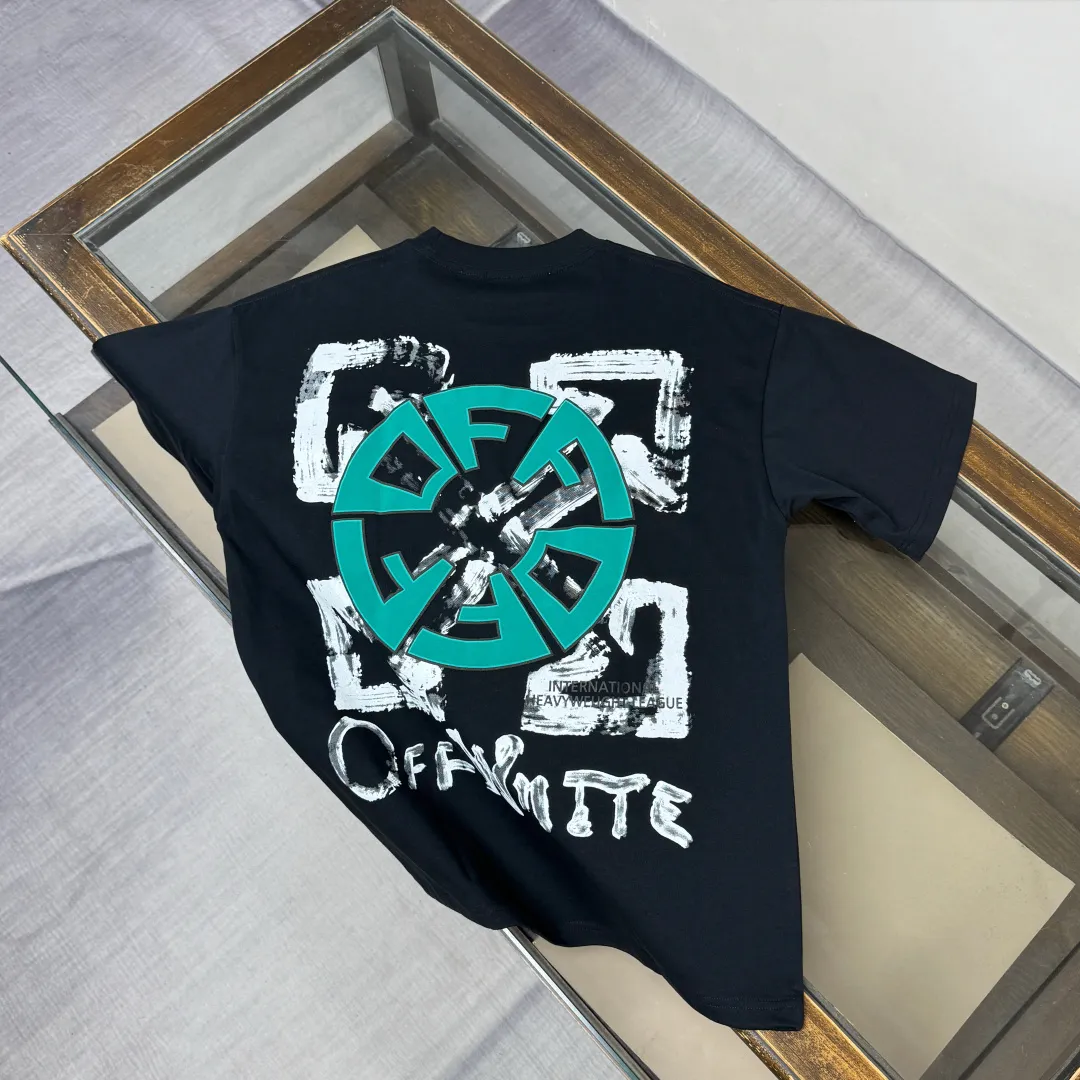 C🌟 OFF-WHITE 2026ss new spring and summer couple's round neck T-shirt🔥 Luxurious brand letter LOGO mark👍🏼 You can feel the youthfulness and fashion brought by this design on your upper body! The overall style is fashionable and trendy. The fabrics are made of top-quality fabrics supplied by customers. They are soft, skin-friendly, breathable, and have good stiffness and drape. The upper body is in fashionable and trendy colors. It is a must-have item for summer! Color: Black White Orange Size: XS-S-M-L (loose fit, please state your height and weight when placing an order)