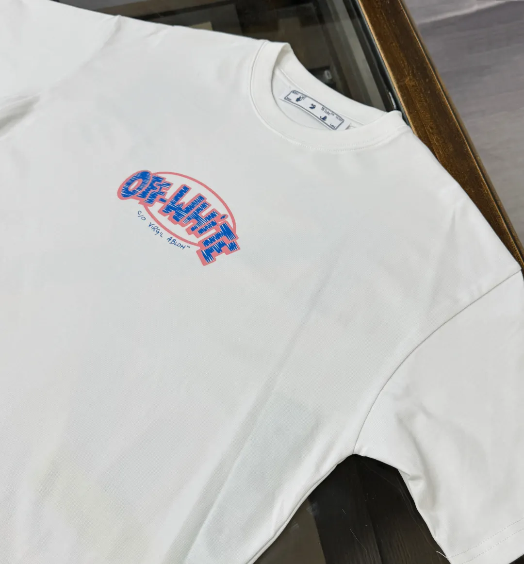 C🌟 OFF-WHITE 2026ss new spring and summer couple's round neck T-shirt🔥 Luxurious brand letter LOGO mark👍🏼 You can feel the youthfulness and fashion brought by this design on your upper body! The overall style is fashionable and trendy. The fabrics are made of top-quality fabrics supplied by customers. They are soft, skin-friendly, breathable, and have good stiffness and drape. The upper body is in fashionable and trendy colors. It is a must-have item for summer! Color: Black White Orange Size: XS-S-M-L (loose fit, please state your height and weight when placing an order)
