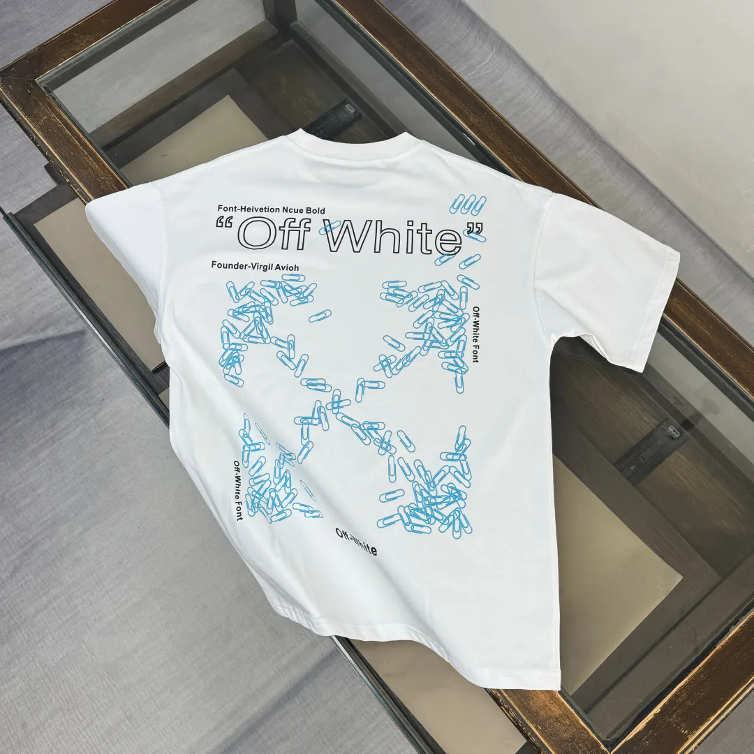 C🌟 OFF-WHITE 2026ss new spring and summer couple's round neck T-shirt🔥 Luxurious brand letter LOGO mark👍🏼 You can feel the youthfulness and fashion brought by this design on your upper body! The overall style is fashionable and trendy. The fabrics are made of top-quality fabrics supplied by customers. They are soft, skin-friendly, breathable, and have good stiffness and drape. The upper body is in fashionable and trendy colors. It is a must-have item for summer! Color: Black White Size: XS-S-M-L (loose fit, please state your height and weight when placing an order)