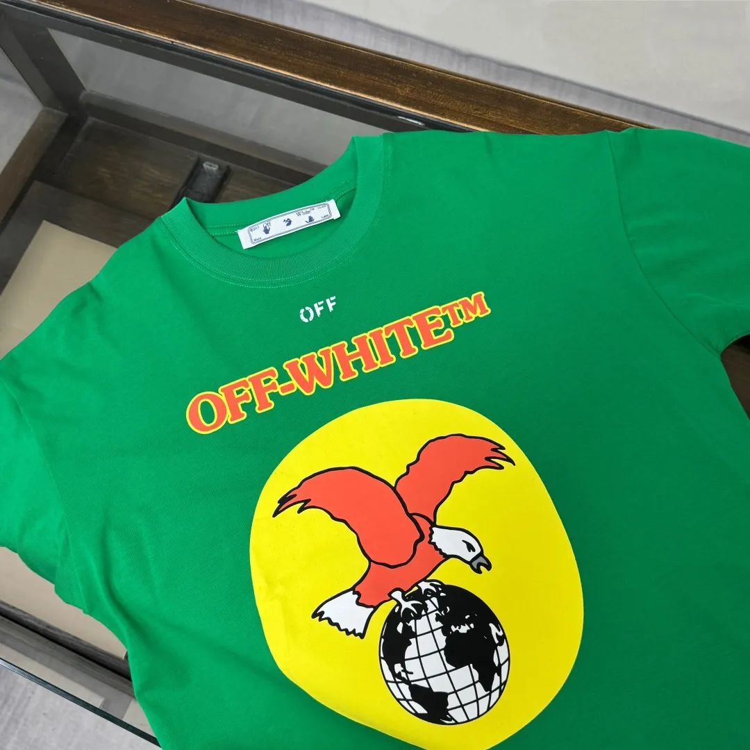 C🌟 OFF-WHITE 2026ss new spring and summer couple's round neck T-shirt🔥 Luxurious brand letter LOGO mark👍🏼 You can feel the youthfulness and fashion brought by this design on your upper body! The overall style is fashionable and trendy. The fabrics are made of top-quality fabrics supplied by customers. They are soft, skin-friendly, breathable, and have good stiffness and drape. The upper body is in fashionable and trendy colors. It is a must-have item for summer! Color: Black White Green Size: XS-S-M-L (loose fit, please state your height and weight when placing an order)