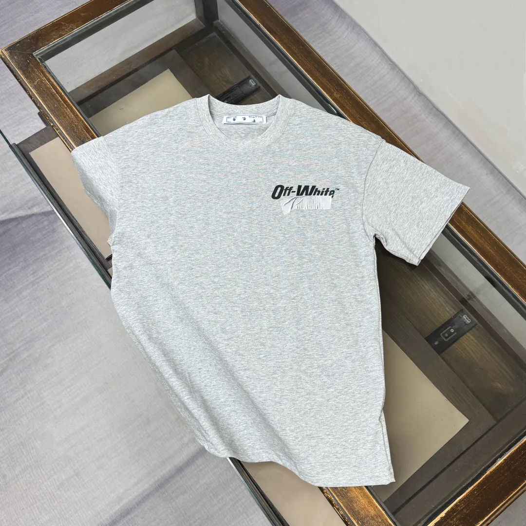 C🌟 OFF-WHITE 2026ss new spring and summer couple's round neck T-shirt🔥 Luxurious brand letter LOGO mark👍🏼 You can feel the youthfulness and fashion brought by this design on your upper body! The overall style is fashionable and trendy. The fabrics are made of top-quality fabrics supplied by customers. They are soft, skin-friendly, breathable, and have good stiffness and drape. The upper body is in fashionable and trendy colors. It is a must-have item for summer! Color: Black White Gray Size: XS-S-M-L (loose fit, please state your height and weight when placing an order)