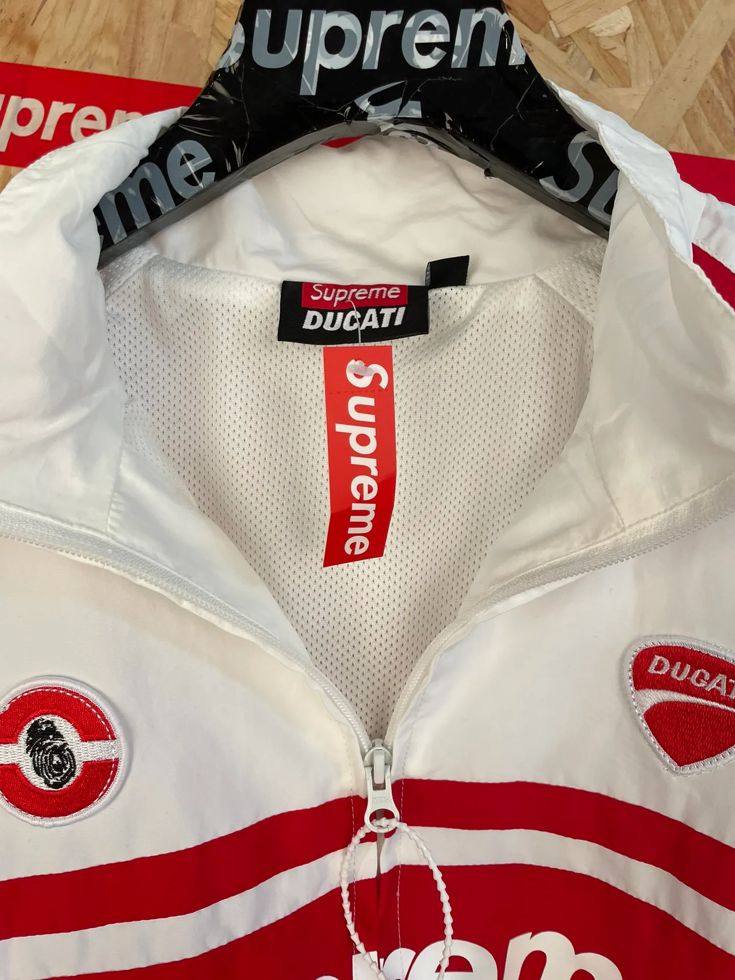 Style No.: 8102 Supreme x Ducati Joint Series Functional Racing Style Suit Windbreaker Jacket Size: S M L XL Color: White Jacket
