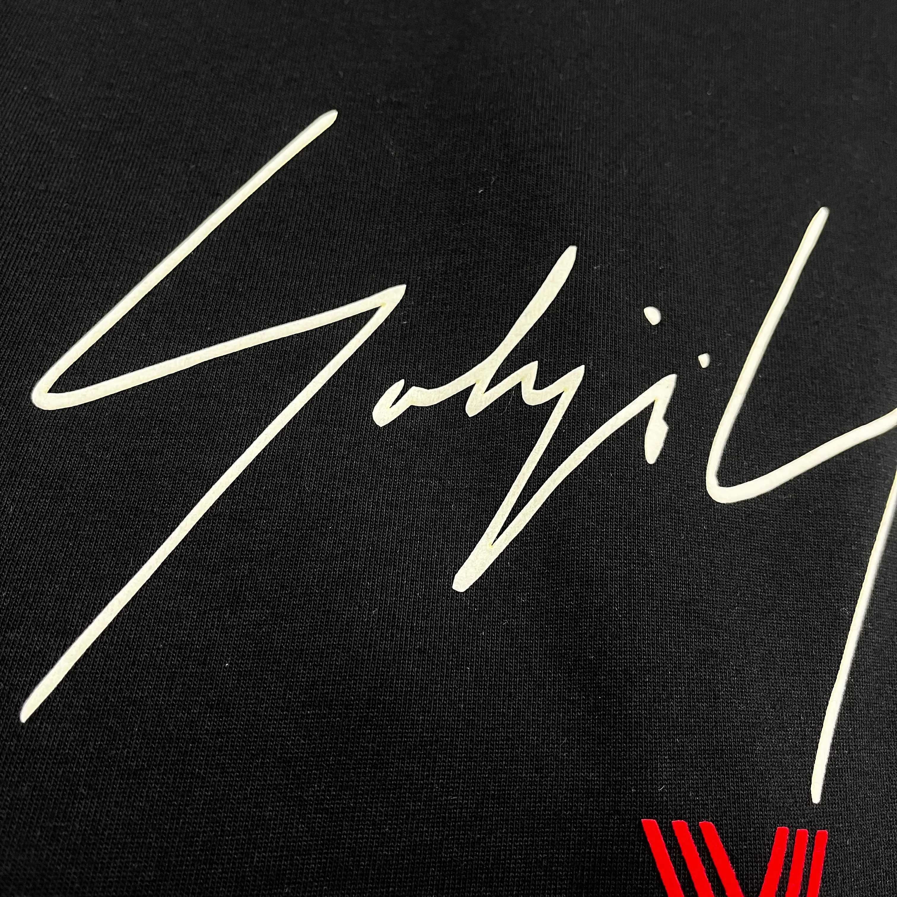 Y 3* * *yoji 2026 Spring and Summer New Arrival Simple signature letters Y-3 flocking technology Double yarn custom plain cotton fabric Short-sleeved T-shirt Men and women Same Style Color: Black White Size: S (90-130 pounds) M (120-150 pounds) L (140-165 pounds) XL (160-180 pounds) XXL (180 pounds)
