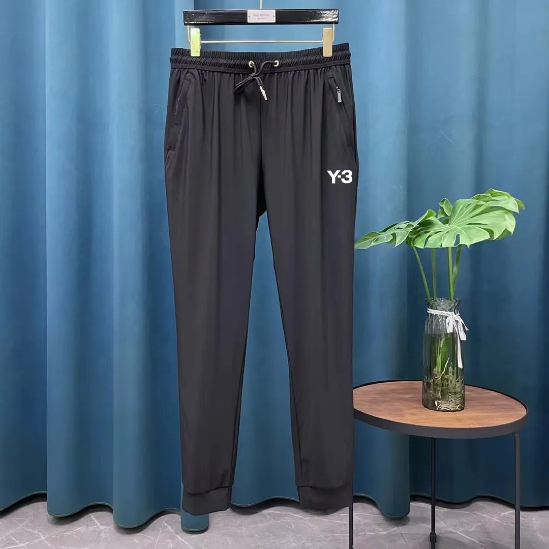 Y 3 annual New Arrival ice silk elastic quick-drying casual sports straight trousers with sun protection. These pants are very Versatile, with elastic waist and widened and thickened waistband! Straightforward design! 3D three-dimensional craftsmanship tailoring the upper body to highlight the figure! Selected ice silk four-way stretch fabric, comfortable and smooth to the touch! The drape is great! No pilling, no fading, cool and comfortable! Technical fabrics are really very technical! It’s like a single layer of skin! Extremely cool! ! Stretch fabric on all sides! It has elasticity both horizontally and vertically, and is very breathable! The upper body is very comfortable! Simple and elegant style! Not too much cumbersome design! Exquisite craftsmanship! Quality is in place! No need to say more about this! Once you buy it and wear it, you will know that it can be worn for daily work and outdoor sports. This style has been designed by many famous designers and is the perfect combination of fashion, leisure and outdoor sports, so it is your best choice whether you wear it daily or outdoors. Color: Black Gray Size S-XL