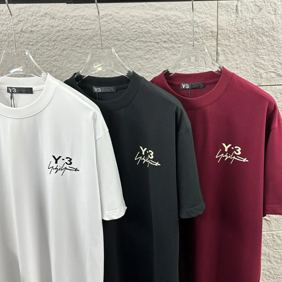 Y 3*Yamamoto*Yoji 2026 Spring and Summer New Arrival Simple signature letters three-dimensional flocking technology Y-3 Customized double yarn plain cotton fabric Short-sleeved T-shirt Men and women Same Style Color: Black White Angora Red Size: S (90-130 pounds) M (120-150 pounds) L (140-165 pounds) XL (160-180 pounds) XXL (180 pounds)