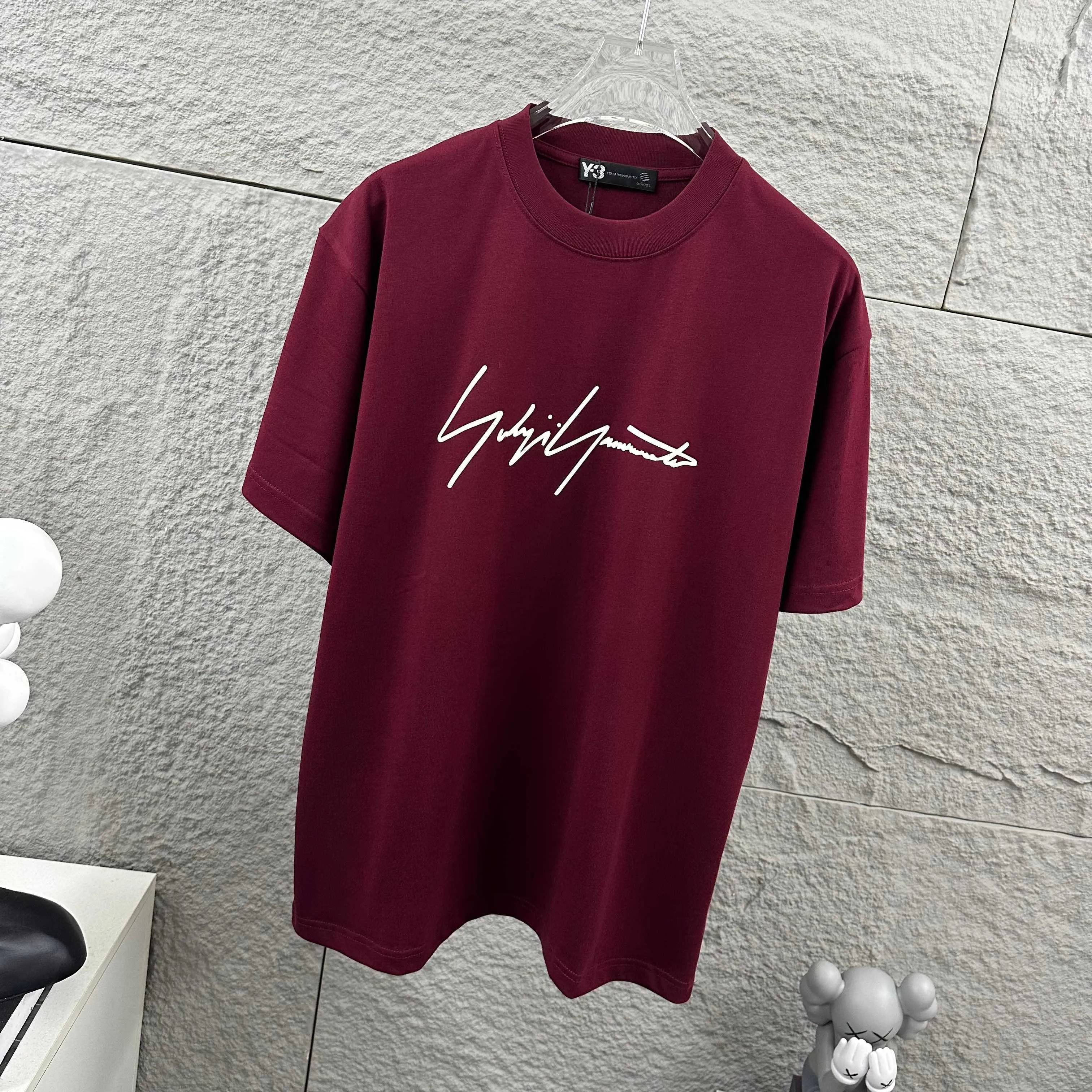 Y 3*Yamamoto*Yoji 2026 Spring and Summer New Arrival Simple signature letters three-dimensional foaming technology Y-3 Customized double yarn plain cotton fabric Short-sleeved T-shirt Men and women Same Style Color: Black White Angora Red Flower Gray Size: S (90-130 pounds) M (120-150 pounds) L (140-165 pounds) XL (160-180 pounds) XXL (180 pounds)