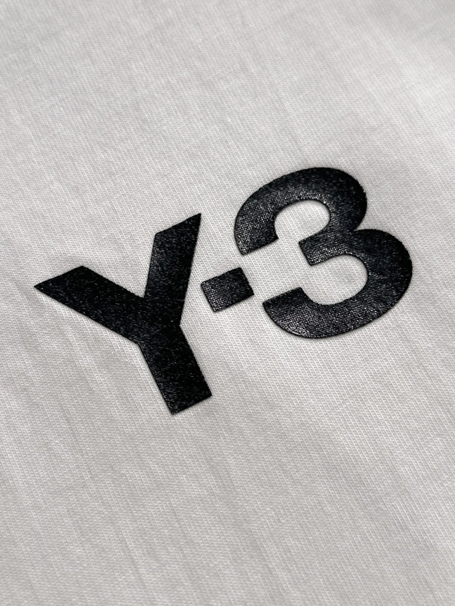 Y 3 Yohji Yamamoto × Adidas 2026 New Arrival Embossed logo Classic three-bar patch Embroidered signature letters on the back Same Style for men and women Short-sleeved T-shirt Customized gram 100% double yarn pure cotton fabric Custom dyed 32 double-strand threads Collar label, hangtag, main mark and three labels complete Color: White Size: S M L XL