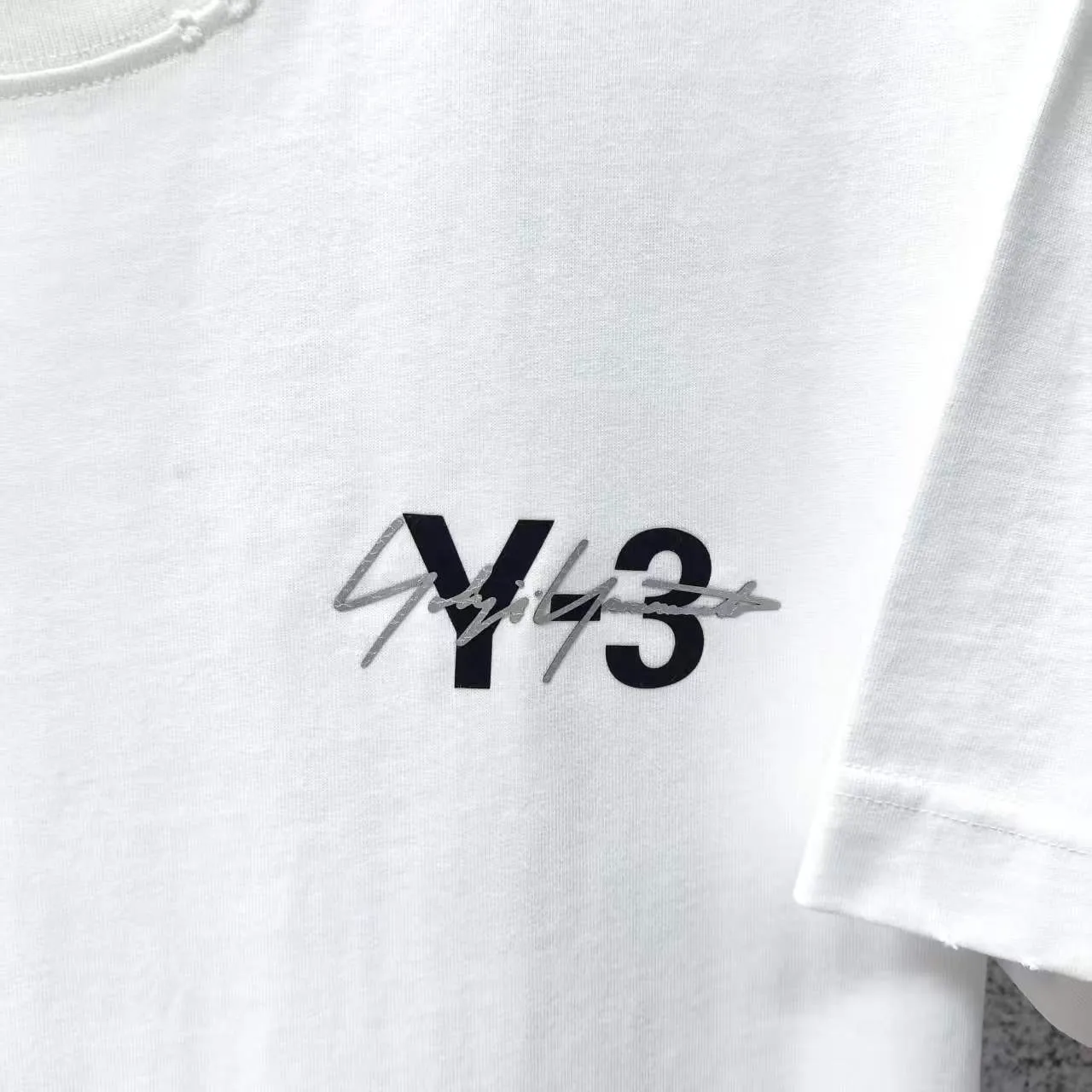 Y 3 Yohji Yamamoto 2026 Spring and Summer New Arrival g neck sleeves frayed washed and distressed flocked hot silver logo short-sleeved T-shirt loose fit for men and women Same Style Size S M L XL XXL Wash Black Wash White Wash Gray